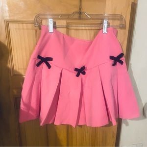 NWT - Kawaii Bubblegum pink pleated skirt with black velvet bow trim - L